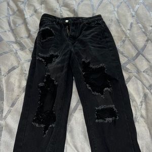 Jeans with rips, runs a little baggy